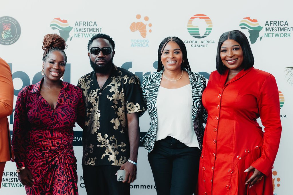 Guests at an Africa Investment Network backdrop, Ghana